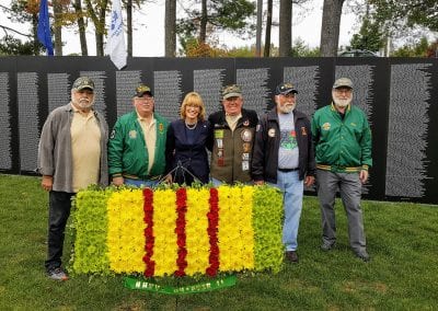 Some Chapter 41 members with Senator Maggie Hassan at the Wall.